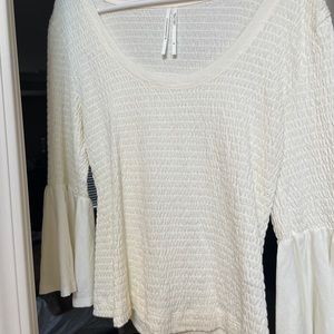 Anthropologie scoop neck with bell arms.